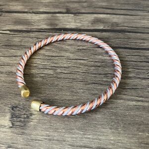 NWOT Adjustable copper and silver tone bangle bracelet with brass accents